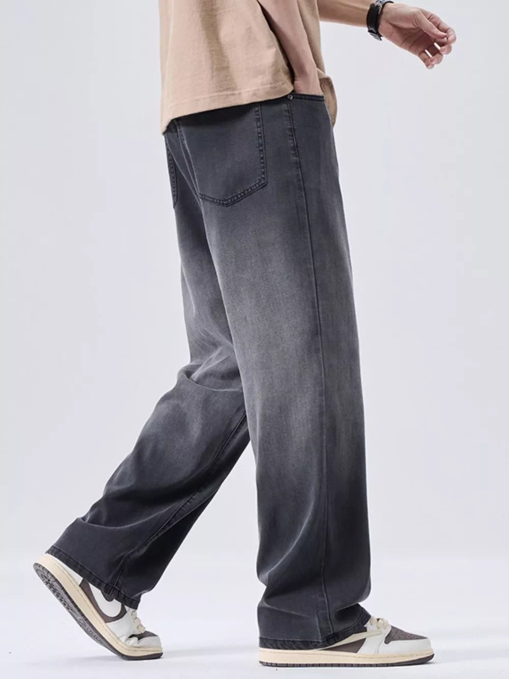 Men's relaxed fit sweatpants in dark grey with a vintage wash and wide leg.