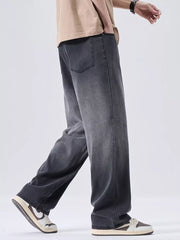 Men's relaxed fit sweatpants in dark grey with a vintage wash and wide leg.