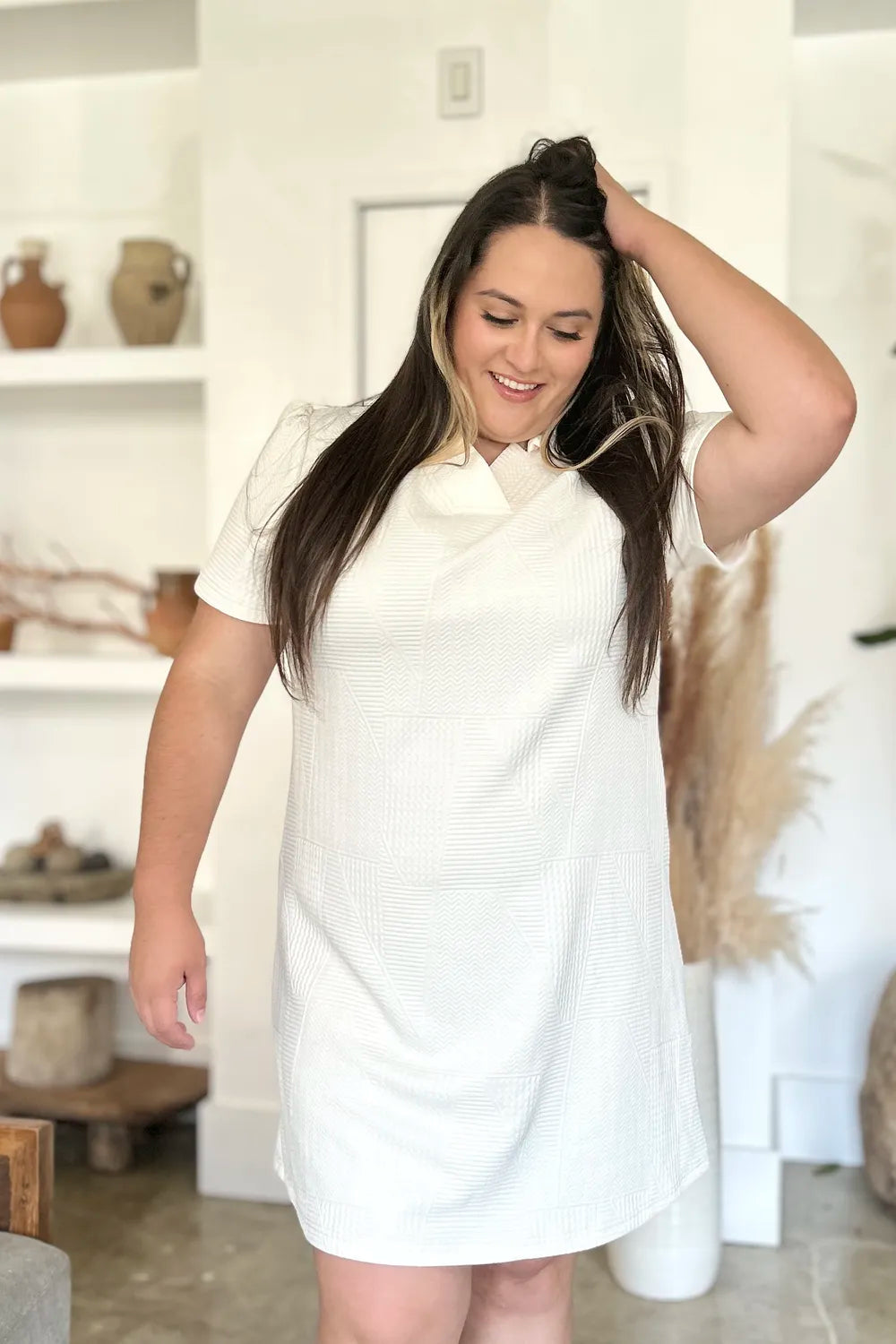 Ivory textured V-neck short sleeve mini dress with geometric pattern
