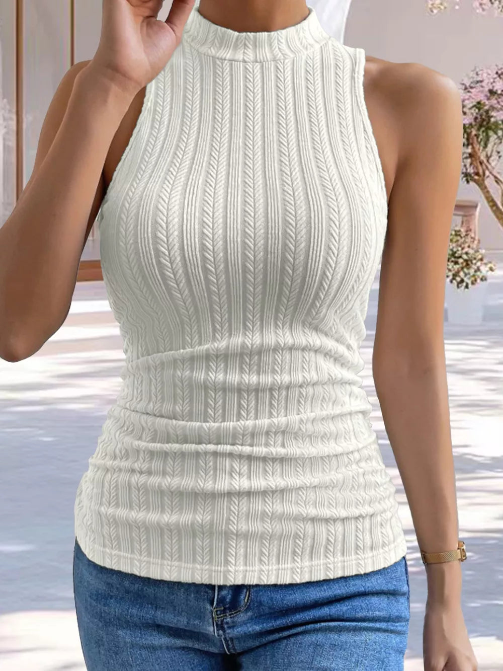 White ribbed mock neck tank top with ruched sides.
