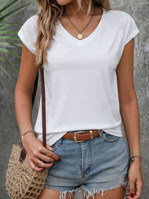 White cap sleeve slouchy v-neck tee shirt with a relaxed fit.