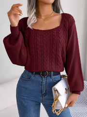 Wine cable knit sweater with square neckline and balloon sleeves.