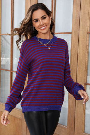Classic Breton stripe knit crewneck sweater in dark blue and maroon acrylic, with crewneck and long sleeves.