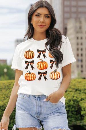 White t-shirt with watercolor pumpkins and black bows with bats pattern.