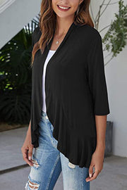Black waterfall cardigan with asymmetric hemline and 3/4 sleeves.