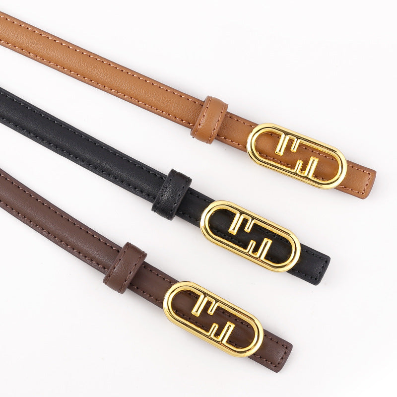 Elegant oval buckle leather belts in brown, black, and caramel with gold hardware.