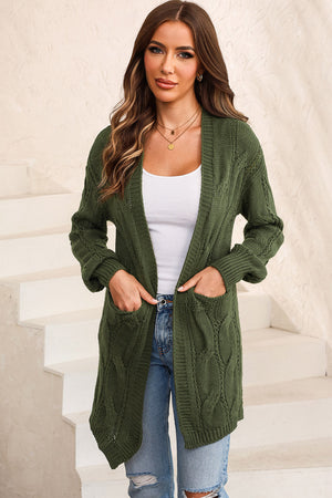 Matcha green cable knit open-front cardigan with pockets and ribbed cuffs.