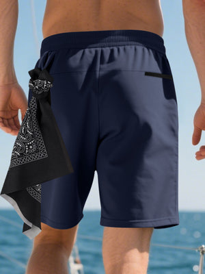 Navy blue chino shorts with drawstring waist and black bandana detail.