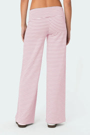 Blush pink and white striped palazzo pants with a high waist.