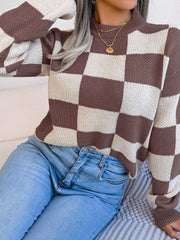 Checkerboard knit mock neck pullover sweater in brown and cream acrylic.