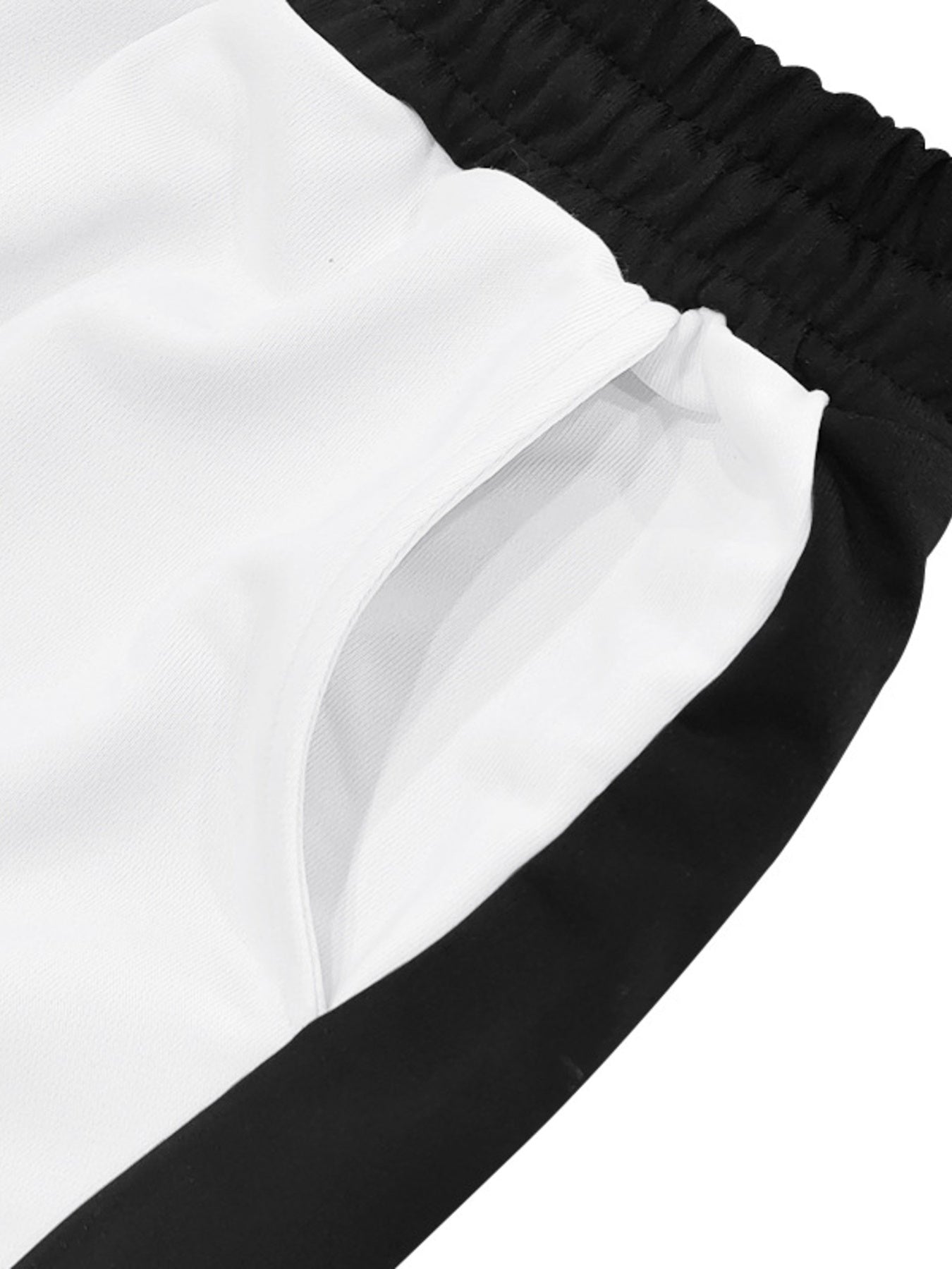 White sweatpants with black side stripe detail and pocket.