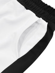 White sweatpants with black side stripe detail and pocket.