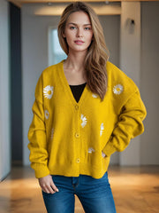 Mustard yellow acrylic oversized knit cardigan with daisy embroidery and buttons