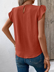 Terracotta textured blouse with flutter sleeves and keyhole back detail.