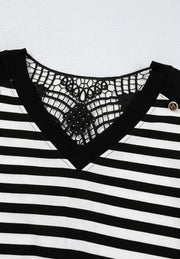 Black and white striped blouse with V-neck and black lace detail on back.
