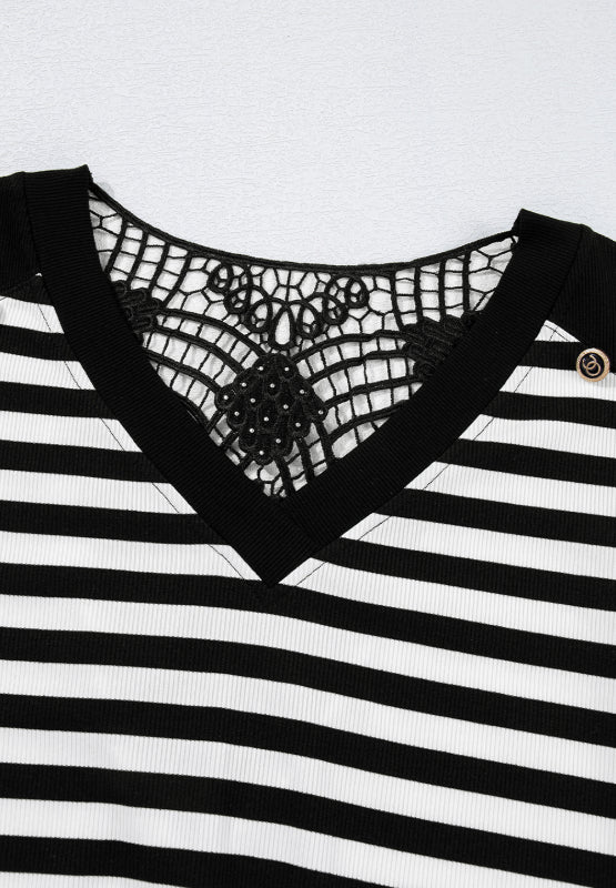 Black and white striped blouse with V-neck and black lace detail on back.