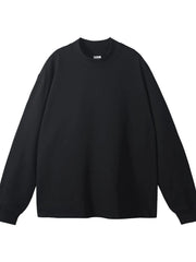 Black oversized crewneck long sleeve t-shirt with a mock neck detail.