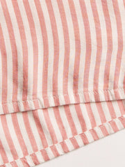 Striped pajama set in pale blush with contrast trim detail