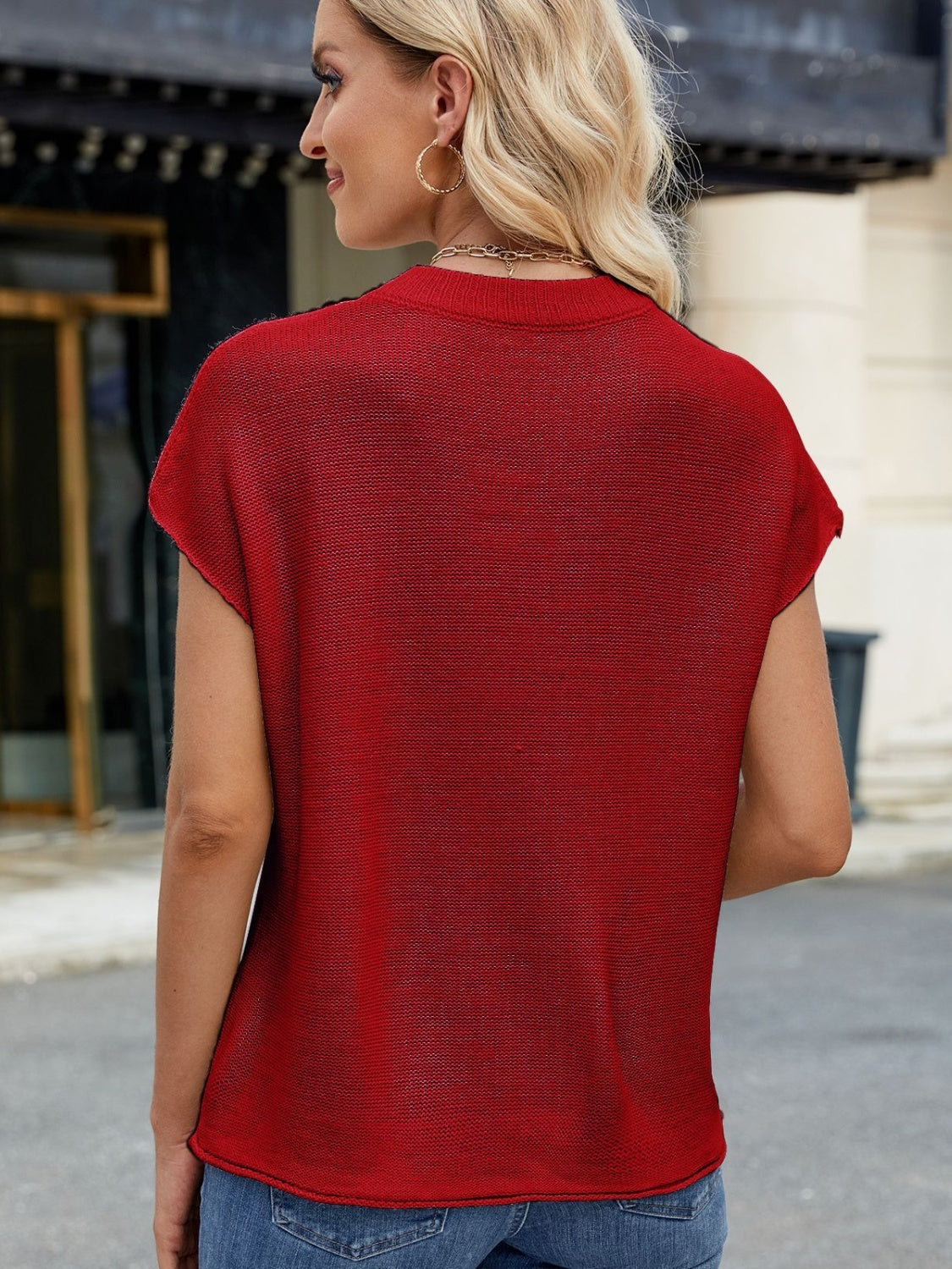 Scarlet knit cap sleeve top with vertical seams, crew neck, and relaxed fit.