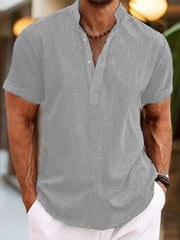 Gray linen blend henley shirt with mandarin collar and short sleeves.