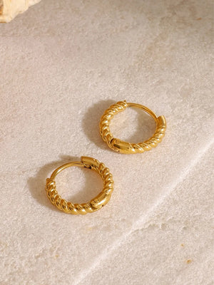 Gold twisted mini hoop earrings with a textured rope design.