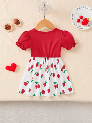 Baby dress with red top and white cherry print skirt, puff sleeves