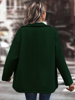 Oversized black forest shirt jacket with collared neckline and button front, shown from the back.