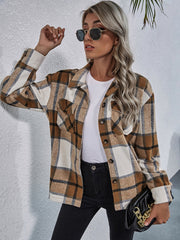 Checkered collared jacket in tan and white with button front and chest pockets.