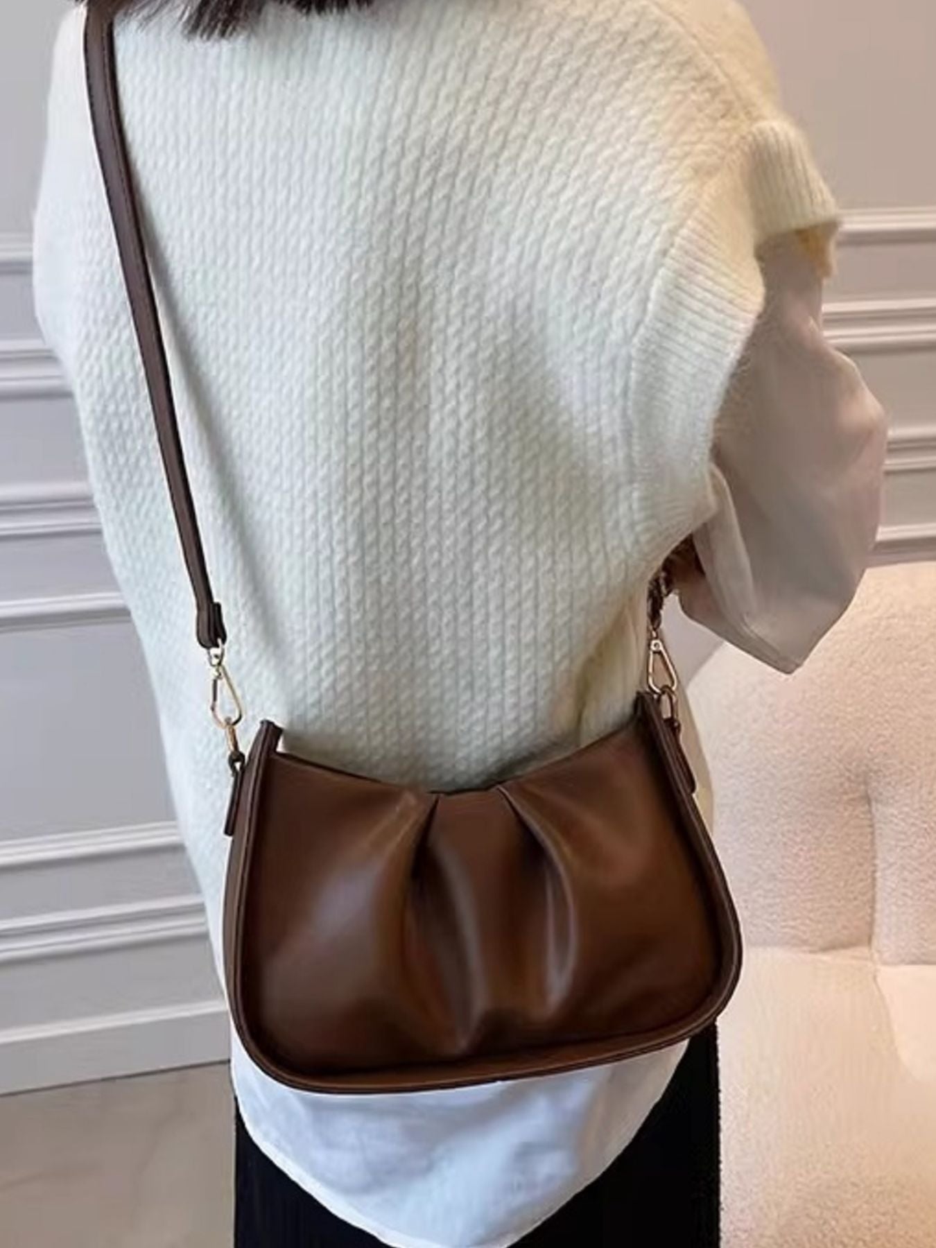 Brown ruched crossbody bag with braided strap detail
