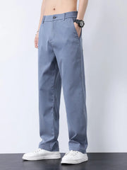 Relaxed fit light blue casual pants with subtle texture and elastic waistband.