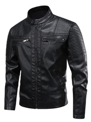 Black leather motorcycle jacket with quilted shoulder and sleeve details and zippered pockets.