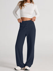 Button-front palazzo trousers in dark navy with high waist and patch pockets.