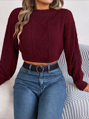 Wine cable knit cropped mock neck sweater with diamond pattern detail.