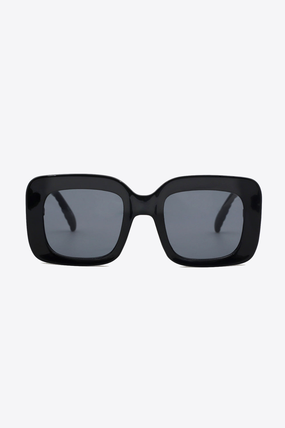 Black rectangular sunglasses with textured arms and dark lenses.