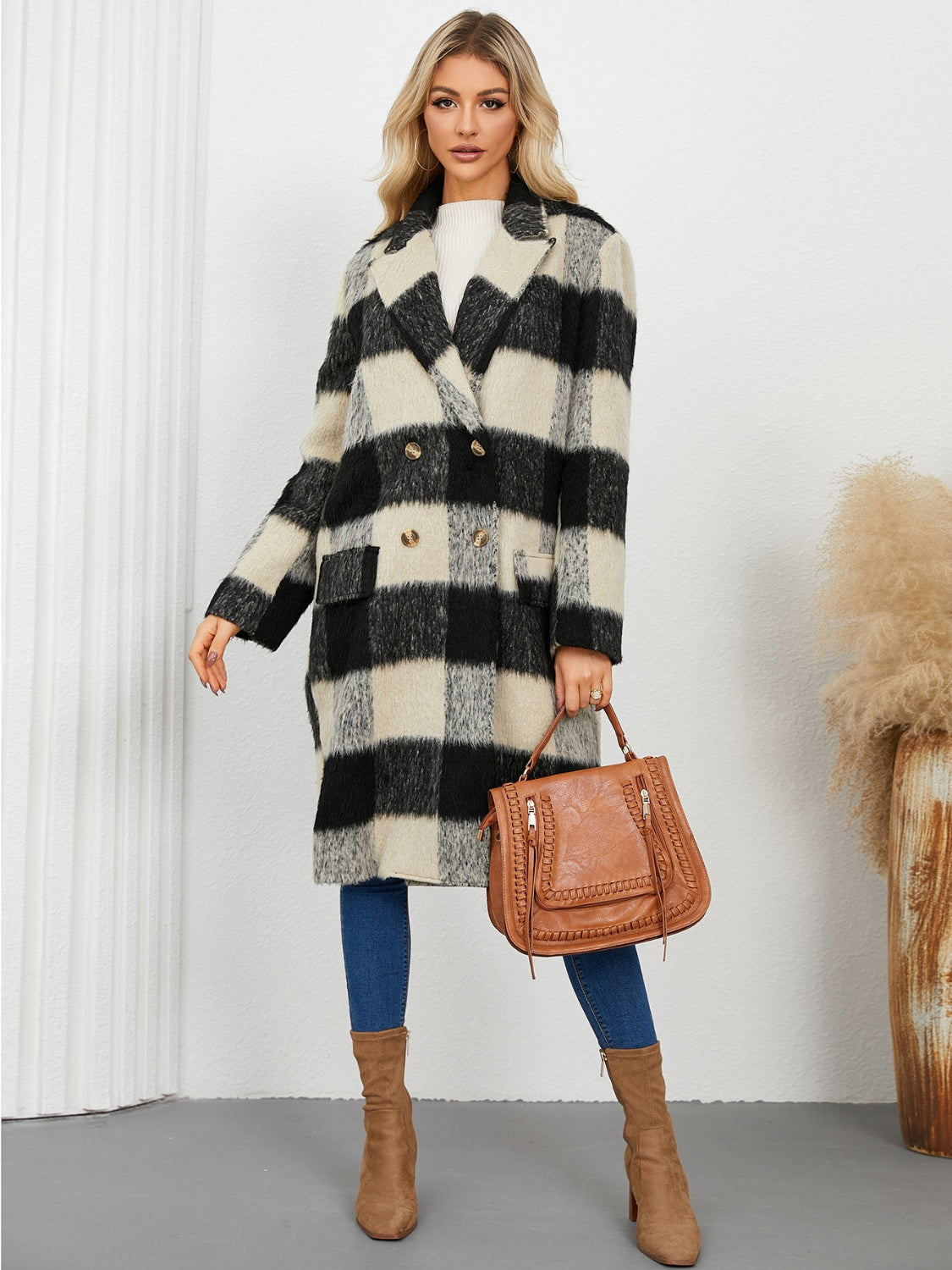 Checked plaid double-breasted cocoon coat with gold buttons and large lapels.