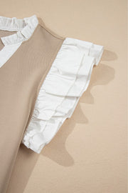 Khaki blouse with white contrast collar and ruffle sleeves.
