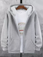 Gray fleece-lined zip-up hoodie with a white graphic t-shirt underneath.