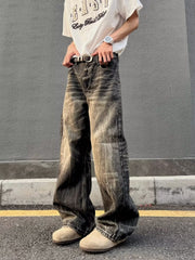 Men's vintage wash wide-leg jeans in relaxed fit, featuring distressed details and a comfortable cotton fabric.