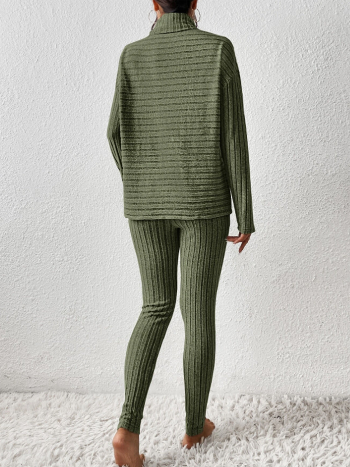 Matcha green ribbed turtleneck lounge set with horizontal texture on top and vertical on pants.