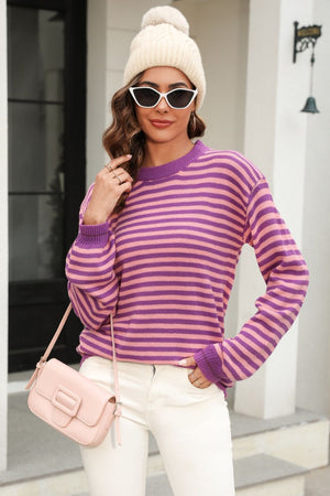 Classic Breton stripe knit crewneck sweater in pink and purple acrylic.