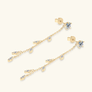 Gold dangling crystal vine earrings with delicate chain and marquise-shaped accents.