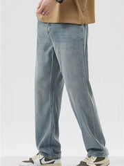 Relaxed fit wide-leg denim trousers in light blue, with a casual, basic style.