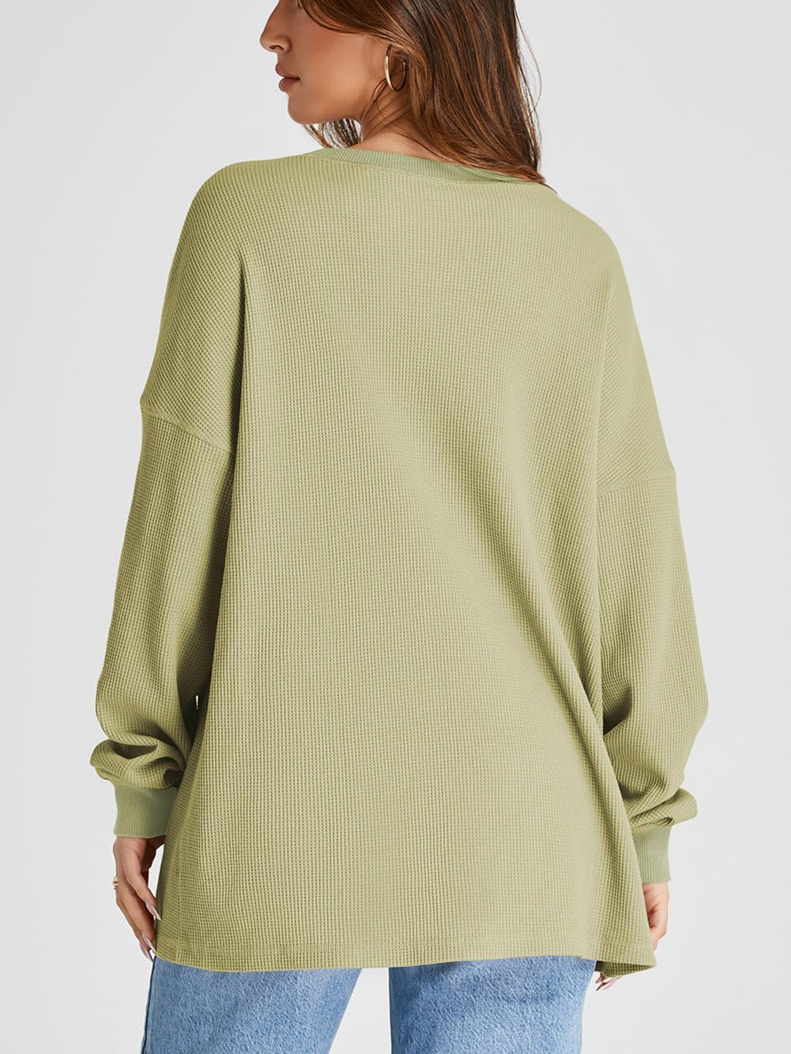 Sage waffle knit raglan sleeve sweatshirt with crew neck and relaxed fit.