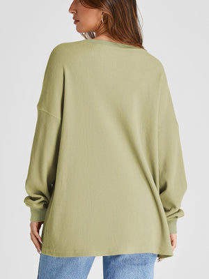 Sage waffle knit raglan sleeve sweatshirt with crew neck and relaxed fit.