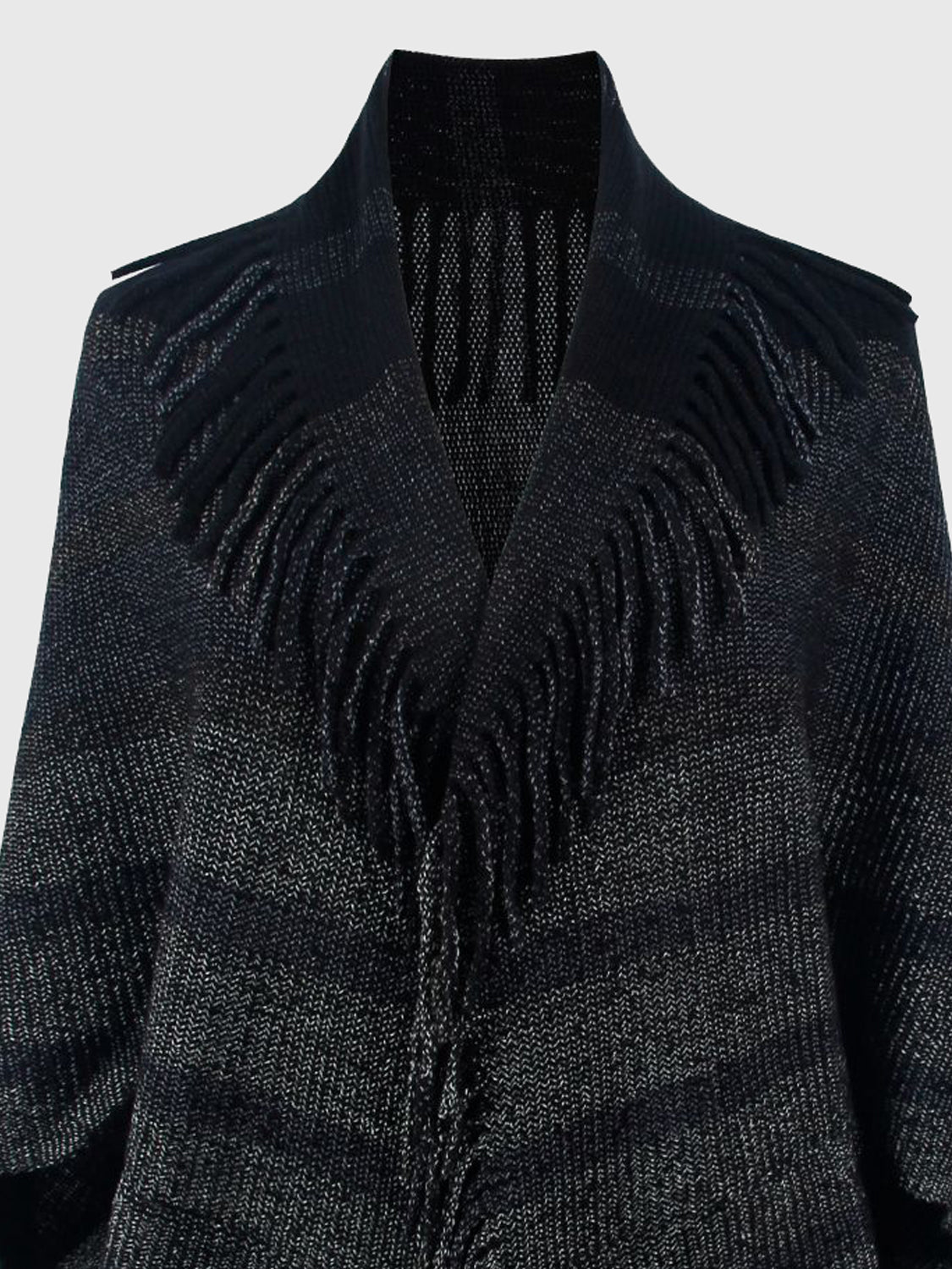 Textured black knit capelet with fringe detail and open front.