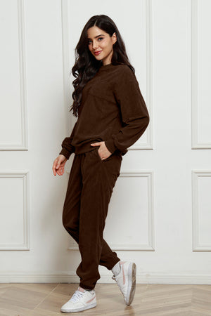 Chocolate corduroy loungewear set with crewneck sweatshirt and pocket detail.