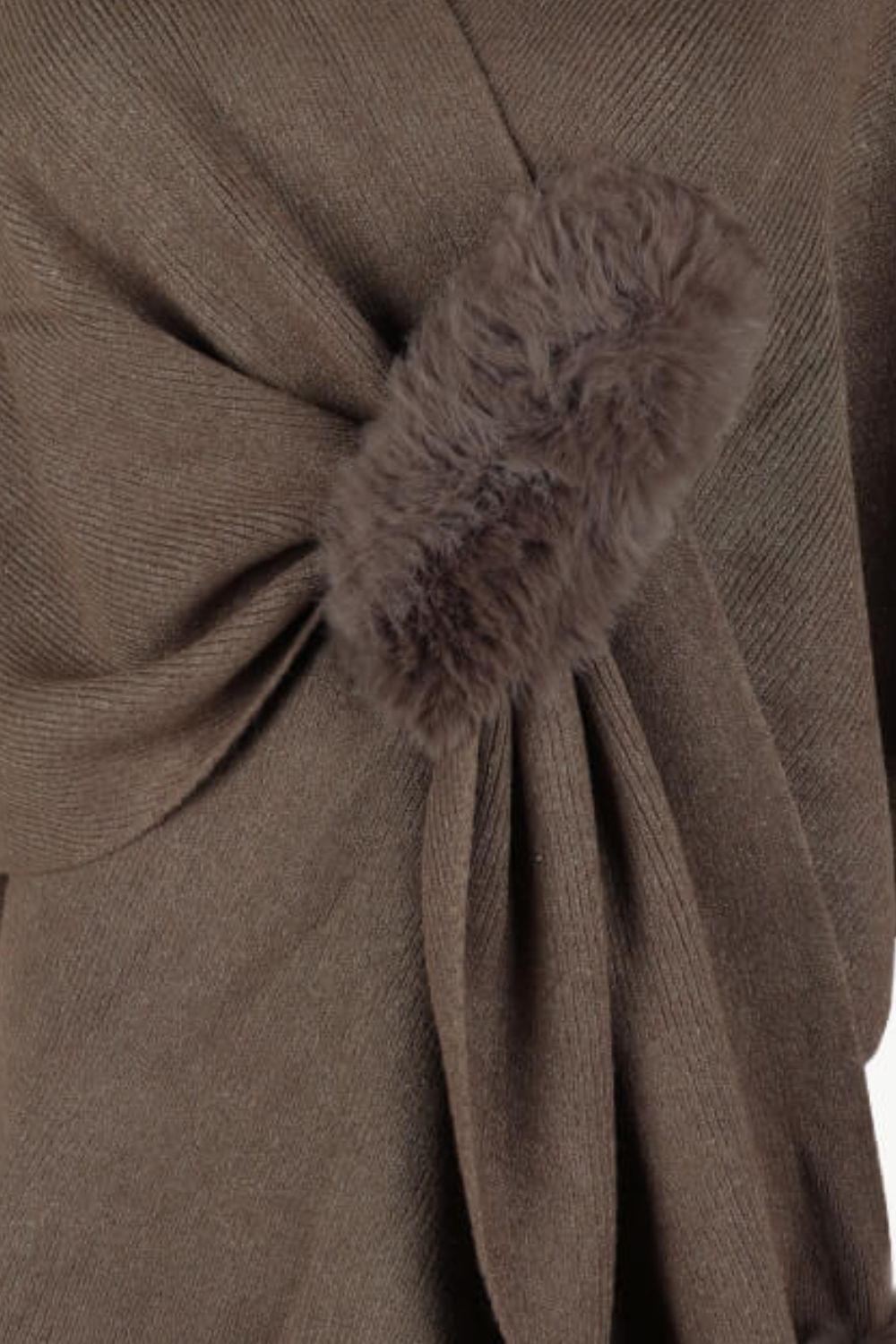 Taupe knit cape with faux fur trim detail.