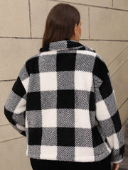 Black and white plaid shacket with fluffy texture and collar detail.