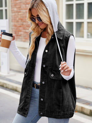 Black denim utility gilet with grey hood and button closures.