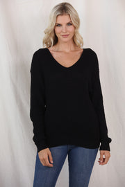 Black relaxed knit V-neck pullover sweater with long sleeves.